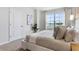 Bright bedroom with natural light, a large window, and a comfortable bed setting at 2903 Canary Ave, Davenport, FL 33837