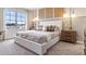 Bright bedroom with a large window, stylish decor, and a comfortable bed at 2903 Canary Ave, Davenport, FL 33837
