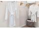 Well-organized closet with white robes and ample storage space at 2903 Canary Ave, Davenport, FL 33837