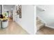 Inviting hallway with tile floors leads to the staircase and living areas at 2903 Canary Ave, Davenport, FL 33837
