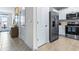 Modern kitchen with stainless steel appliances and a view of the entry at 2903 Canary Ave, Davenport, FL 33837