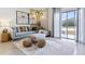 Comfortable living room with a plush sectional sofa, decorative rug, and sliding glass doors at 2903 Canary Ave, Davenport, FL 33837