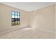 Bright and airy bedroom with a large window offering natural light, and tile flooring at 3166 Canby Dr, Deltona, FL 32738