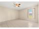 Simple bedroom with tile flooring and a window offering natural light at 3166 Canby Dr, Deltona, FL 32738