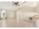 Inviting living room boasting tile flooring, a ceiling fan, and a bright, open layout at 3166 Canby Dr, Deltona, FL 32738