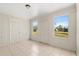 Light-filled room with tile flooring and multiple windows at 3166 Canby Dr, Deltona, FL 32738