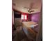 Bedroom featuring wood flooring, window with curtain, and a bed at 3219 Chariot Pl, Orlando, FL 32818