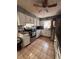 Traditional kitchen with white cabinets, stainless steel appliances, and tile flooring at 3219 Chariot Pl, Orlando, FL 32818