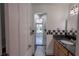 A bathroom with an entry to an additional room and a tiled floor at 3220 Cardigan Ct, Orlando, FL 32812