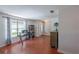 Bright living room with wood floors, a large window, and stylish furnishings at 3220 Cardigan Ct, Orlando, FL 32812