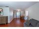 Spacious living area with hardwood floors and neutral walls, perfect for entertaining and relaxation at 3220 Cardigan Ct, Orlando, FL 32812