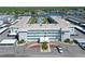 Waterway East condo complex with a central pool, parking, and landscaping at 325 N Causeway # D-206, New Smyrna Beach, FL 32169
