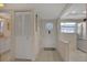 Condo entryway featuring tile flooring, closet, and view to the kitchen at 325 N Causeway # D-206, New Smyrna Beach, FL 32169