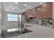 Modern kitchen with stainless steel appliances, stylish cabinetry, and ample countertop space at 325 N Causeway # D-206, New Smyrna Beach, FL 32169