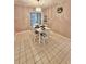 Cozy dining room with a decorative chandelier and neutral decor, perfect for Gathering meals at 329 Kantor Blvd, Casselberry, FL 32707