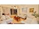Bright living room with light-colored furniture, hardwood floors, and lots of natural light at 329 Kantor Blvd, Casselberry, FL 32707