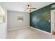 Modern bedroom features wood floors, a unique accent wall, and natural light at 3425 N Westmoreland Dr, Orlando, FL 32804