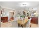 Inviting dining area connected to kitchen with bright lighting and plenty of seating with open floor plan at 3425 N Westmoreland Dr, Orlando, FL 32804