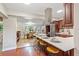 Spacious kitchen with a large island, modern appliances, and an open view to the dining area at 3425 N Westmoreland Dr, Orlando, FL 32804