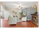 Cozy living room with a brick fireplace, neutral decor, and plenty of natural light at 3425 N Westmoreland Dr, Orlando, FL 32804