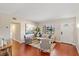 Bright living room with hardwood floors, large window, and stylish furnishings provides a cozy atmosphere at 3425 N Westmoreland Dr, Orlando, FL 32804