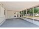 Spacious screened-in porch with access to the backyard, providing a relaxing outdoor space at 3425 N Westmoreland Dr, Orlando, FL 32804