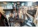 Unique interior space with an industrial-chic design, custom mural, and creative seating options at 391 Shoreview Sands Ave, Mascotte, FL 34753