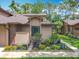 Charming home features a well-manicured lawn and garden, creating a welcoming curb appeal at 419 Newton Pl, Longwood, FL 32779