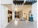 Open-concept kitchen with a breakfast bar, stainless steel appliances, and seamless flow to living spaces at 419 Newton Pl, Longwood, FL 32779