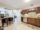 This well-appointed kitchen features stainless steel appliances, sleek countertops, and a breakfast bar at 419 Newton Pl, Longwood, FL 32779