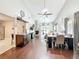 Spacious open-concept living area with vaulted ceilings, fireplace, and modern furnishings at 419 Newton Pl, Longwood, FL 32779