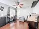 Functional office space with hardwood floors, a ceiling fan, and natural light at 419 Newton Pl, Longwood, FL 32779