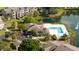 Community with a swimming pool, pond with fountain, and well maintained landscaping at 4708 Walden Cir # 37, Orlando, FL 32811