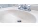 Close-up of a bathroom sink with running water at 4708 Walden Cir # 37, Orlando, FL 32811
