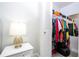 Walk-in closet with ample storage space for clothes and accessories at 4708 Walden Cir # 37, Orlando, FL 32811