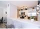 Well-lit kitchen with white cabinetry and stylish backsplash at 4708 Walden Cir # 37, Orlando, FL 32811
