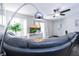 Inviting living room with a plush sofa and entertainment center at 4708 Walden Cir # 37, Orlando, FL 32811