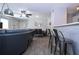 Open-concept living room with modern furnishings and neutral tones at 4708 Walden Cir # 37, Orlando, FL 32811