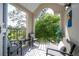 Relaxing balcony area with comfortable seating and peaceful outdoor view at 4708 Walden Cir # 37, Orlando, FL 32811