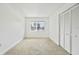 Bright bedroom with closet and neutral carpet, perfect for relaxation at 4713 S Texas Ave # 4713D, Orlando, FL 32839