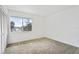 This bedroom offers a closet and a window with views to the neighborhood at 4713 S Texas Ave # 4713D, Orlando, FL 32839
