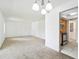 Spacious living room with dining area and an open view to the kitchen at 4713 S Texas Ave # 4713D, Orlando, FL 32839