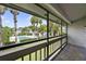 Patio overlooking palm trees and a community pool at 4713 S Texas Ave # 4713D, Orlando, FL 32839