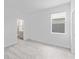 Bright bedroom with a window and neutral carpet at 503 Silver Palm Dr, Haines City, FL 33844