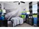 Themed bedroom features a tire track mural, offering a playful and fun space for a  at 503 Silver Palm Dr, Haines City, FL 33844