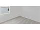 Cozy bedroom with gray carpeting and natural light from the window at 503 Silver Palm Dr, Haines City, FL 33844