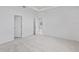 Bright bedroom features neutral walls, carpeted flooring, recessed lights, and a doorway at 503 Silver Palm Dr, Haines City, FL 33844