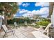 Serene backyard featuring a well-manicured lawn and comfortable seating arrangements at 509 Eastwood Ln, Daytona Beach, FL 32118
