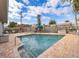 Backyard pool with brick patio, sun loungers, and lush landscaping for relaxation at 509 Eastwood Ln, Daytona Beach, FL 32118