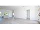 Bright and spacious living room featuring luxury vinyl plank flooring and a modern open concept design at 6872 Sw 132Nd Pl, Ocala, FL 34473